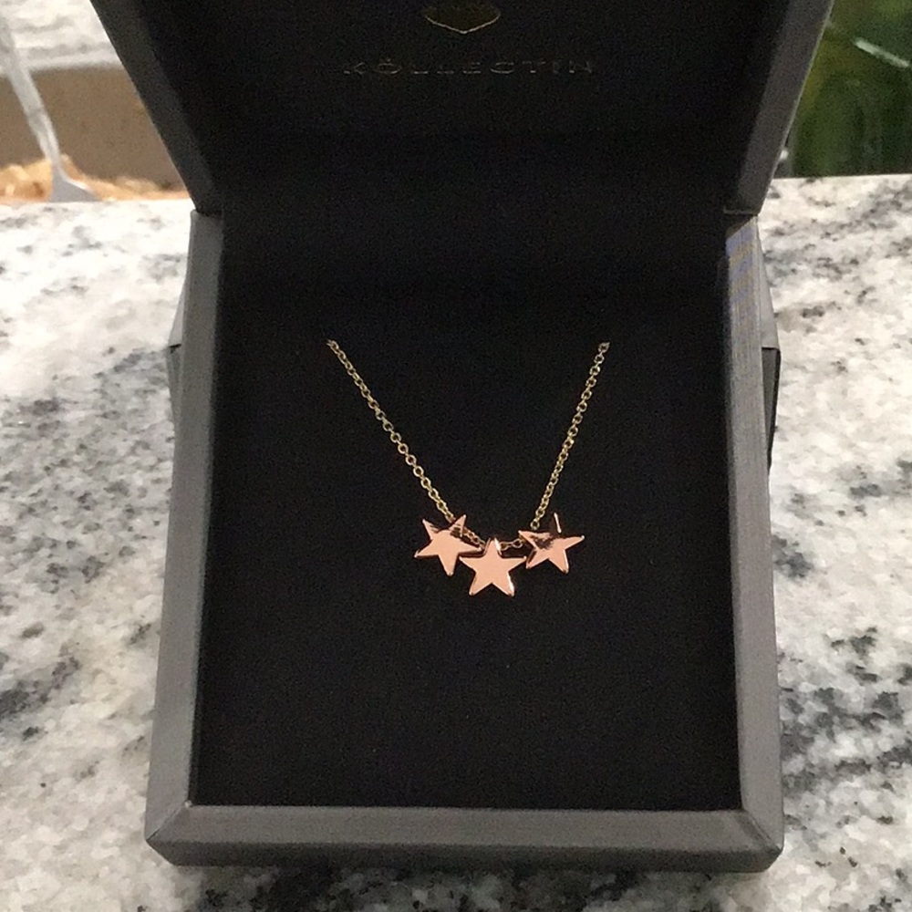 Gold and rose gold star necklace